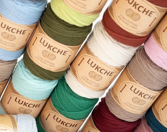 May include: A variety of colors of 3mm cotton macrame cord, each spool labeled "LUKCHE 3MM COTTON MACRAME CORD".