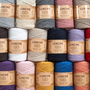May include: Assortment of 10 spools of 4 mm single strand macrame cord in various colors, including natural, gray, pink, white, black, purple, red, yellow, blue, and peach. Each spool has a brown label with the text "LUKCHE 4 mm Single Strand Macrame Cord".