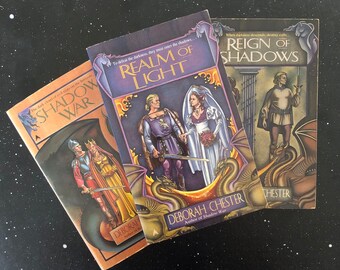 The Ruby Throne Trilogy by Deborah Chester | Reign of Shadows | Shadow War | Realm of Light