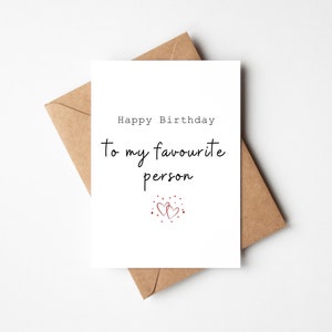 White card with the text 'Happy Birthday to my Favourite Person'. Underneath are two interlocked red hearts