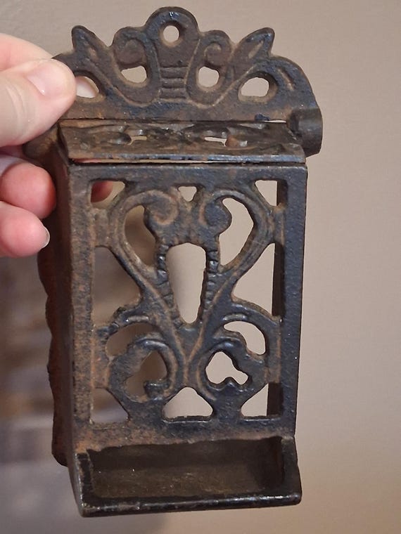 Vintage wrought iron match holder