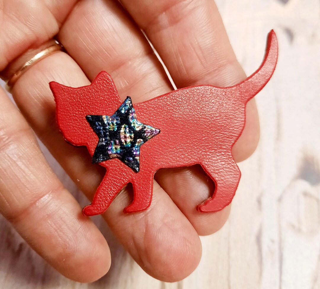 Broche souris avec une crème glacée