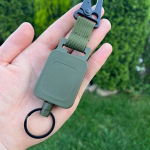 Bobine de badge rétractable en fil d'acier de haute qualité - Porte-cartes porte-clés polyvalent pour les activités de plein air et le travail