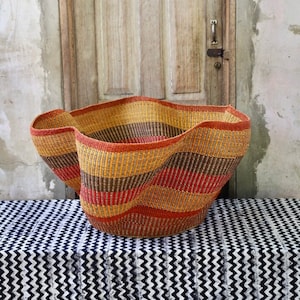 Large handwoven storage basket, floor hamper, Bolga basket, colored rattan laundry basket, wavy art basket, rustic wicker basket, Basabasa