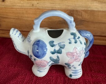 Tetera vintage de elefante azul y blanco