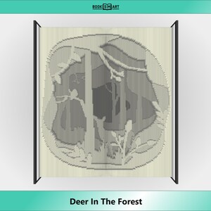 May include: A 3D pop-up book art piece depicting a deer in a forest setting. The book is open and the deer is visible in the centre of the image. The forest is made up of trees and leaves.