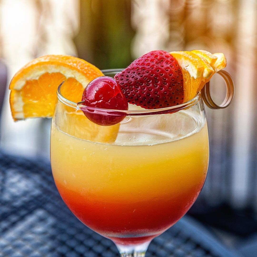 Sunrise Sunset Mimosa Cocktail Drink Mixer. It Has a Peach Mango Base