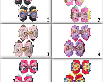 Pair of character hair bows ( stitch, soccer , princess, cow girl, Daysi and Elmo)