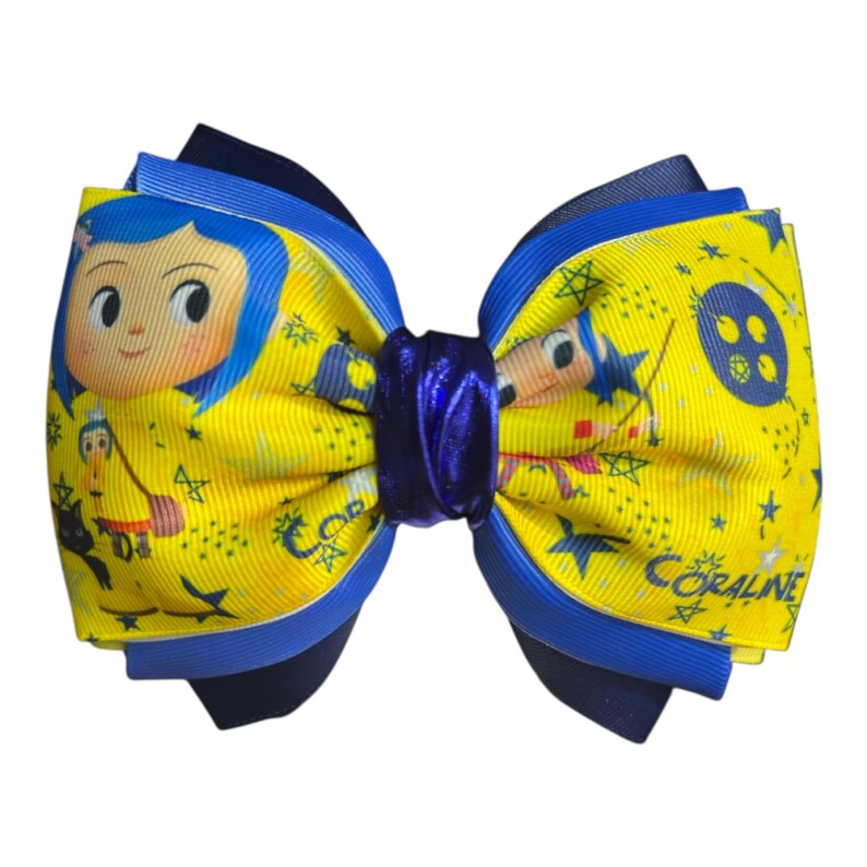May include: A handmade hair bow featuring a cartoon character on a yellow background with blue accents. The bow has a layered design with a dark blue center and the word "CORALINE" printed on the bow.