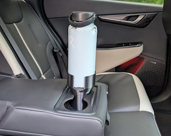 Kia EV6-uitbreiding bekerhouder achter