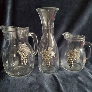 Glass Wine Decanter and  Two Jugs with pewter grapevine design.  Made in Itay