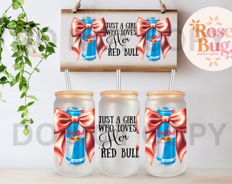 May include: Three frosted glass tumblers with lids and straws. Each tumbler features a red bull can with a pink bow and the text "Just a girl who loves her Red Bull".