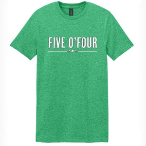 May include: Green t-shirt with the text "FIVE O'FOUR" in white lettering with a shamrock design.