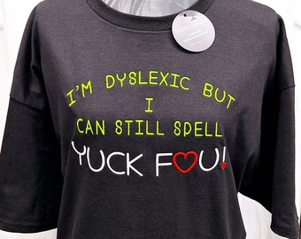 I'm Dyslexic but I can still spell Yuck Fou! Red Embroiderd Black Short Sleeve Shirt