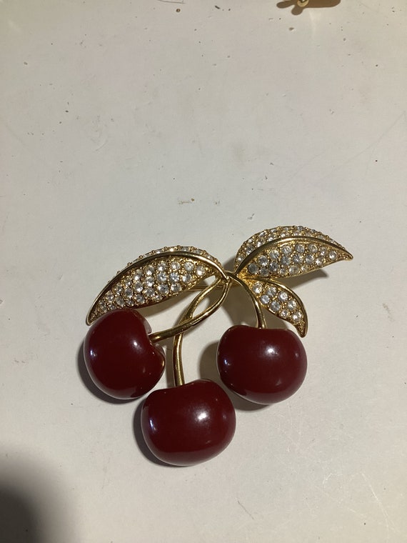 Joan Rivers cherry pin