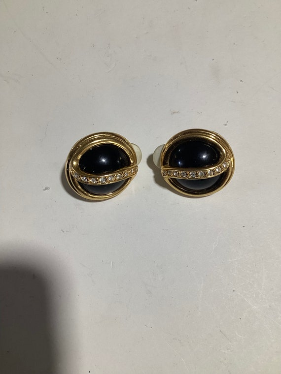 Joan Rivers clip back earrings