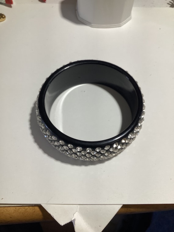 Unsigned crystal studded black bangle