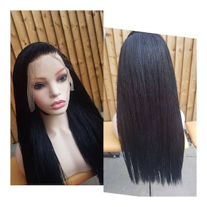May include: A black braided wig with a lace front. The wig is styled in long, straight braids.
