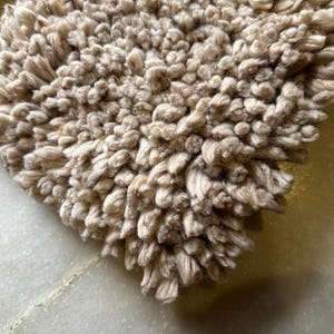 Hand Knotted Beige Wool Shaggy Rug: Custom Scandinavian Style