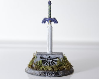 Espada maestra de la leyenda de Zelda impresa en 3D y pintada a mano en piedra