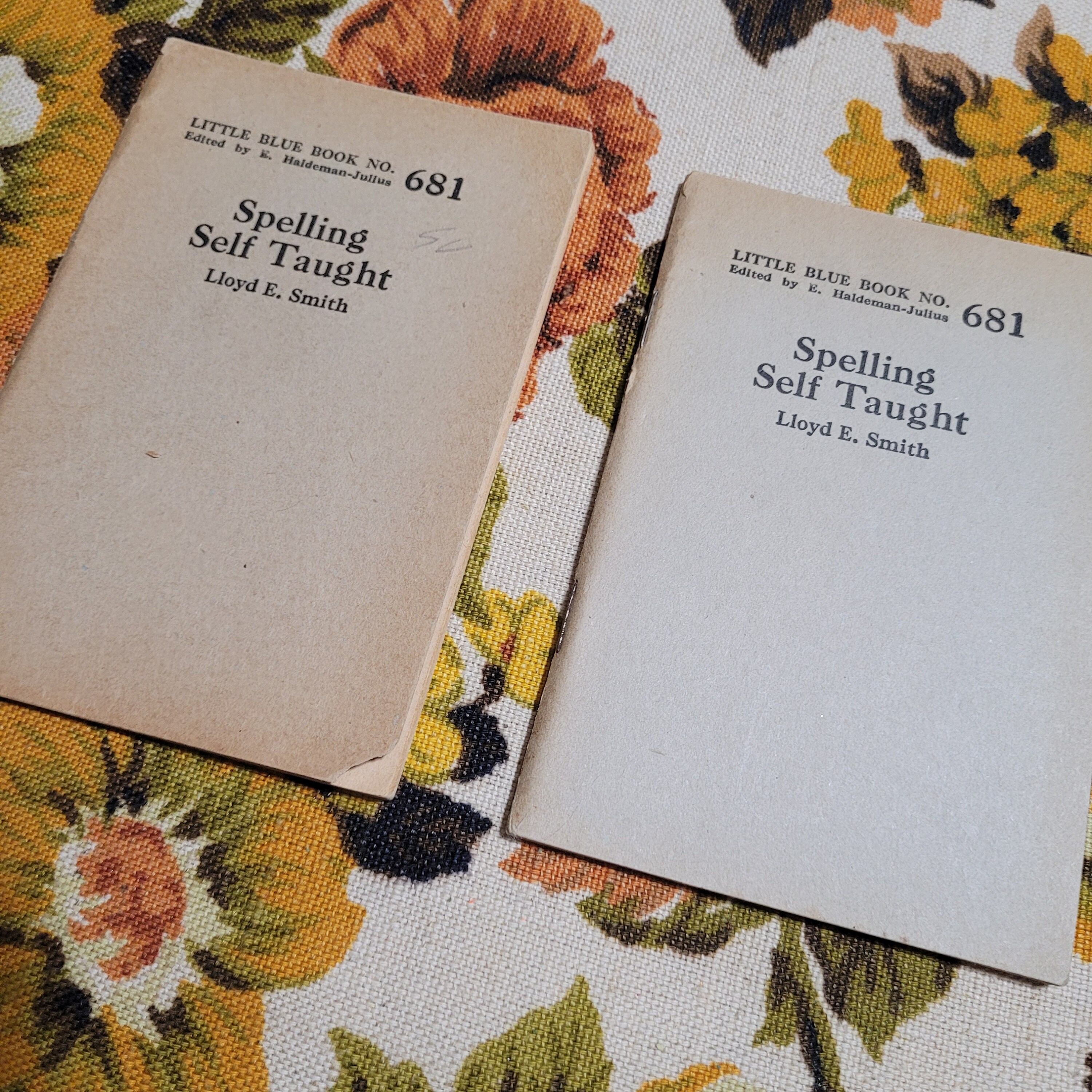 Set of two vintage little blue books spelling self taught by lloyd e