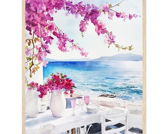 May include: A watercolor painting in a light wood frame depicting a seaside terrace with a white table, two white vases filled with vibrant pink bougainvillea flowers, pink glassware, and a stack of white plates overlooking a blue ocean.