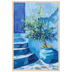 May include: A framed art print depicting a potted olive tree in a light blue ceramic vessel. The scene features a blue door and stone steps in shades of blue and white, rendered in a painterly style with visible brushstrokes and light highlights.