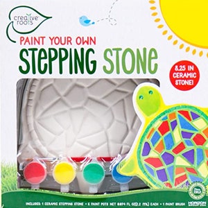 May include: Paint your own stepping stone craft kit featuring a ceramic turtle-shaped stone, six paint pots, and a paint brush. The stone is 8.25 inches in diameter.
