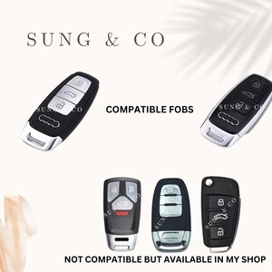 May include: Four different car key fobs, two are compatible and two are not. The compatible fobs are black with silver accents and the incompatible fobs are black with red accents. The text "COMPATIBLE FOBS" and "NOT COMPATIBLE BUT AVAILABLE IN MY SHOP" is displayed on the image.