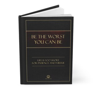 May include: A black leather-bound book with gold lettering. The title is "Be the Worst You Can Be." The subtitle is "Life is too short for patience and virtue." The book has a gold circle with a symbol on the bottom.