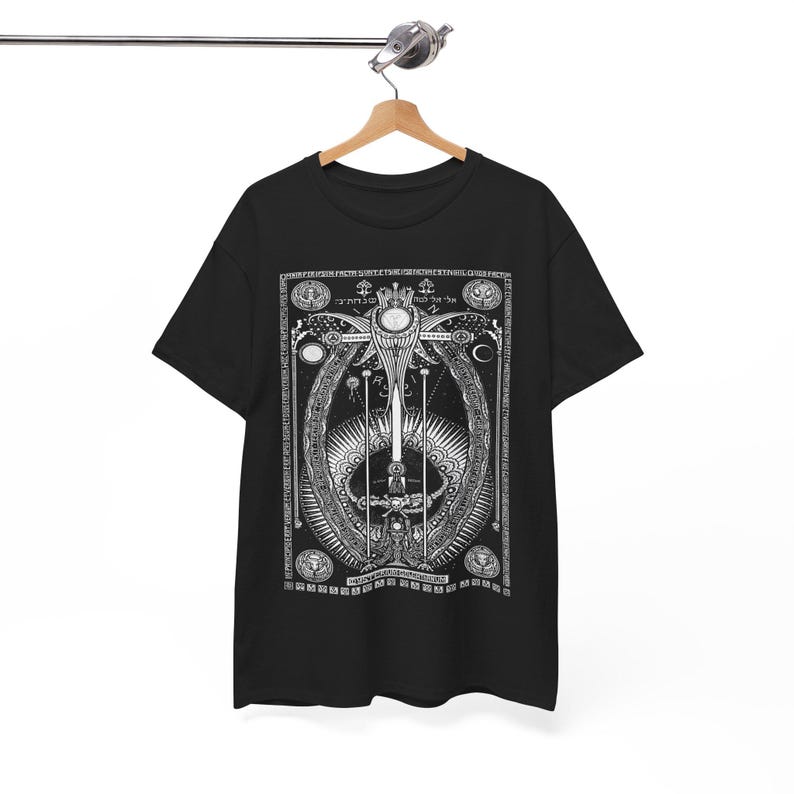 May include: Black t-shirt with a white graphic print of a sword surrounded by a circle of symbols and text. The graphic is centered on the shirt.