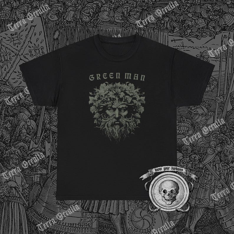 May include: Black t-shirt with a green man graphic and the text "Green Man" above the graphic. The text "Know your darkness" is below the graphic.