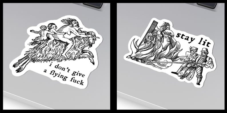 May include: Two black and white stickers. One depicts a mythological scene with the text "I don't give a flying fuck." The other shows figures around a fire, with the text "stay lit."