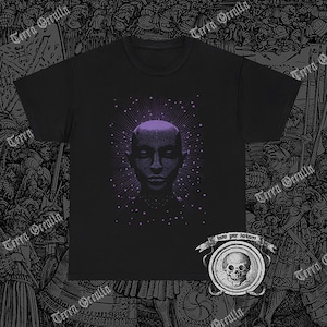 May include: Black t-shirt with a purple and white graphic of a person's face with a starburst around it. The text "know your darkness" is printed below the graphic.