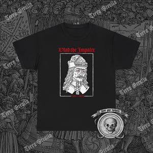 May include: Black t-shirt with a white graphic of Vlad the Impaler, a historical figure, with the text "Vlad the Impaler 1431-1476" and "Know your darkness".