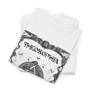 May include: White t-shirt with a black and white graphic design featuring the word "Theosophia" and a stylized bird with wings spread.