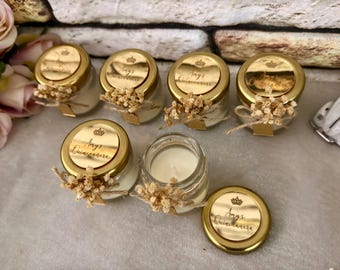 Elegante gouden quinceanera-kaarsgunsten: gepersonaliseerde sojawascadeaus