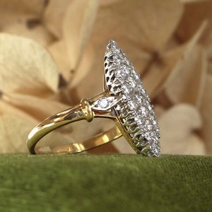 Marquise diamond ring in 18K yellow and white gold