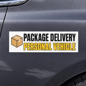 May include: A rectangular vehicle magnet with a white background featuring a brown cardboard box icon on the left. The text reads PACKAGE DELIVERY in black capital letters on the top line and PERSONAL VEHICLE in yellow capital letters below.