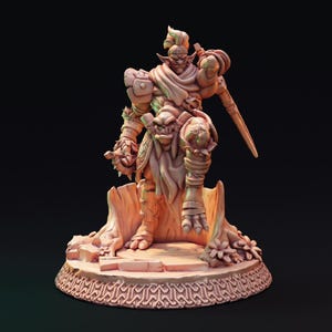 May include: A detailed, tan-colored figurine of a fantasy warrior, posed with a sword and shield. The figure stands on a textured base with intricate carvings. The warrior is adorned with armor and a scarf.