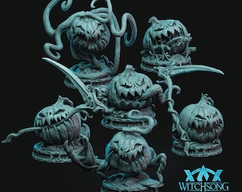May include: Six hand-painted, detailed, miniature pumpkin figurines with spooky faces. Each pumpkin is perched on a base with vines and leaves. The figurines are painted in a light gray color and have a textured finish. The text "WITCHSONG" is visible in the bottom right corner of the image.