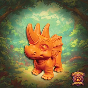 May include: An orange triceratops figurine with a cartoonish design. The dinosaur has three horns, a frill, and is standing on four legs. The background features a forest scene with green and brown tones. The logo "Dungeon Paws" is in the bottom right corner.