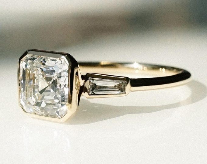 Featured listing image: 2CT Asscher Cut Moissanite Trilogy Ring in 14K Yellow Gold with Baguette Accents | Bezel Set Three Stone Engagement Ring | Gift Ring for Her