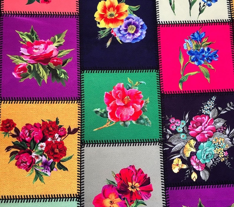 May include: A patchwork design featuring squares of various colors, each adorned with a vibrant floral arrangement. The flowers, in shades of red, pink, blue, and yellow, are set against backgrounds of purple, green, and other hues. Black stitching outlines each square.