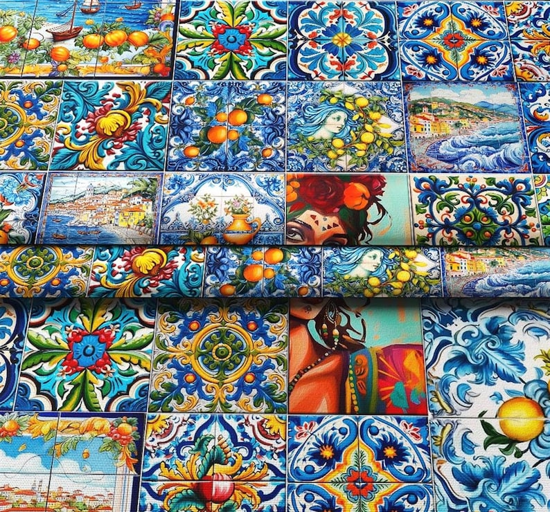 May include: A colorful fabric with a repeating pattern of blue and white tiles. The tiles feature floral designs, geometric shapes, and images of lemons and oranges. The fabric is perfect for crafting projects, home decor, and fashion accessories.