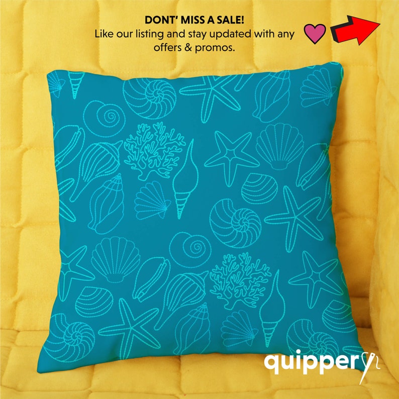 May include: A turquoise blue throw pillow with a white outline of seashells, starfish, and coral. The pillow has the text "quippery" in white on the bottom right corner.