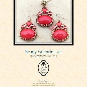 May include: A jewellery set featuring a pendant necklace and matching earrings. The set has a red oval-shaped centre stone surrounded by gold-coloured beads. The earrings have a hook closure. The text "Be my Valentine set" is also visible.