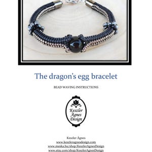 May include: A handcrafted bracelet with a black cord, silver-colored beads, and a large, round, black gemstone in the center. The bracelet is displayed on a light wooden surface. Text on the image reads "The dragon's egg bracelet" and "BEAD WAVING INSTRUCTIONS".
