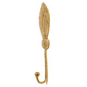 May include: A gold-colored metal hook shaped like a feather. The hook is designed to be mounted on a wall.