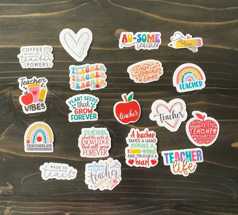 May include: A collection of colorful teacher-themed stickers with various designs and sayings, including "Coffee Gives Me Teacher Powers", "Teacher Vibes", "Plant Seeds That Grow Forever", "Teacher Life", "Au-Some Teacher", "Best Teacher Ever", "Teacher", "A Teacher Takes A Hand Opens A Mind And Touches A Heart", "Made To Teach", "Teacher", and "Herd Leader Friend Teacher Empowering Inspiring Creative".